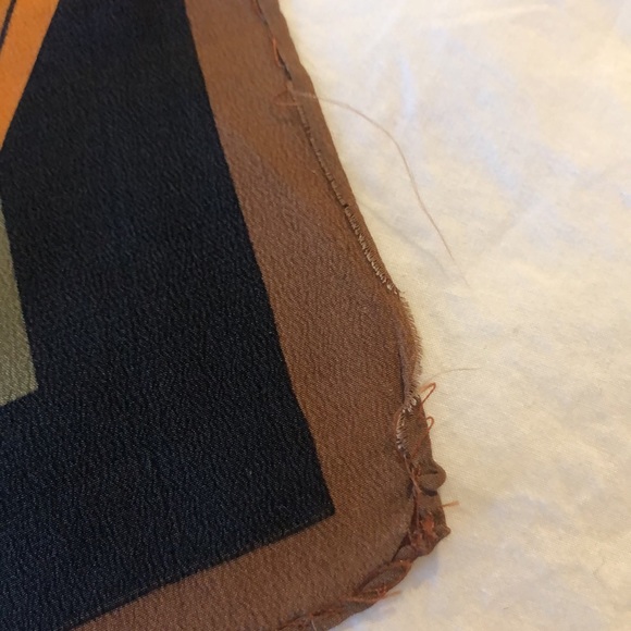 Guy Laroche Paris geometric design scarf.  Orange, rust, brown, black, green. - Picture 4 of 7